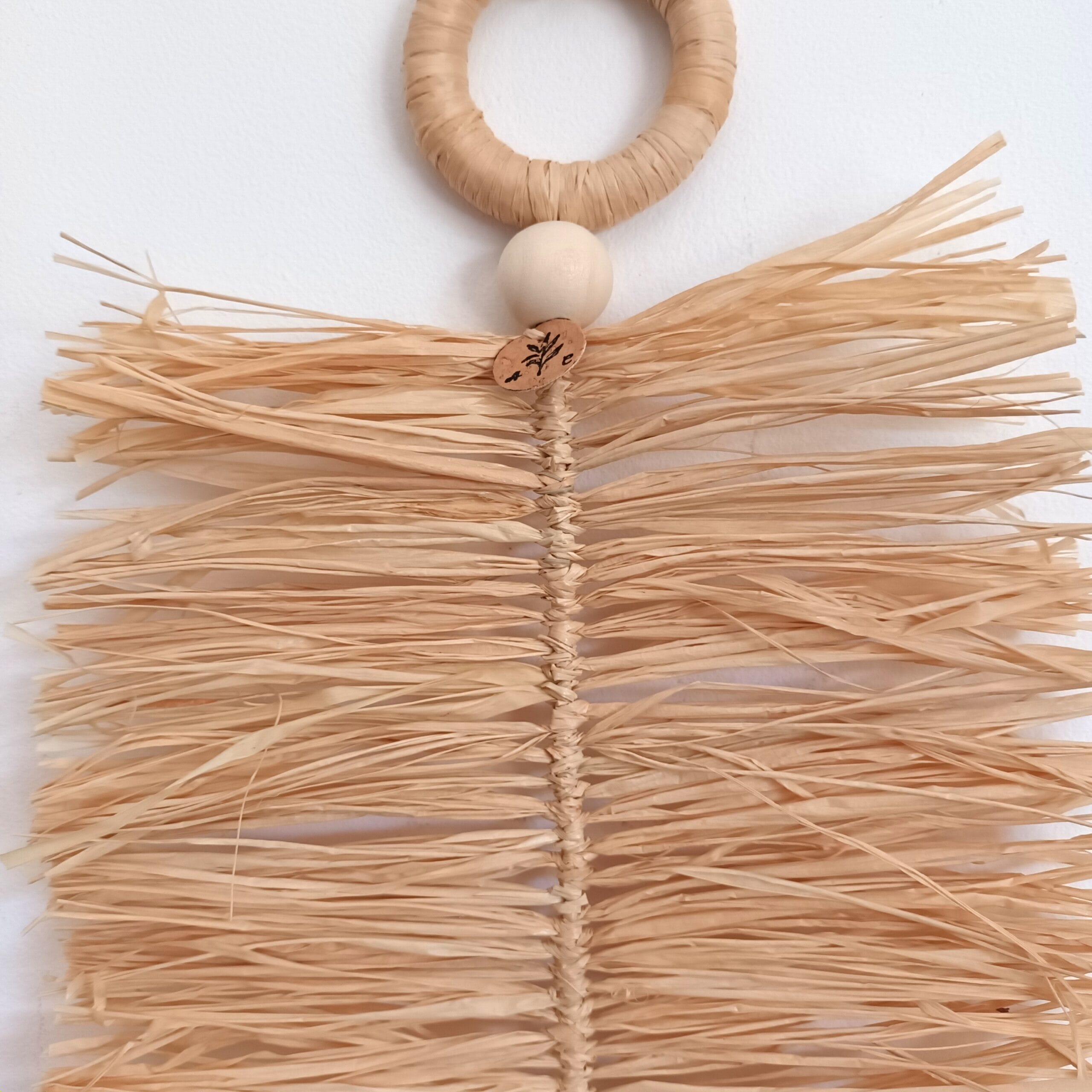 détail de la feuille raphia à suspendre